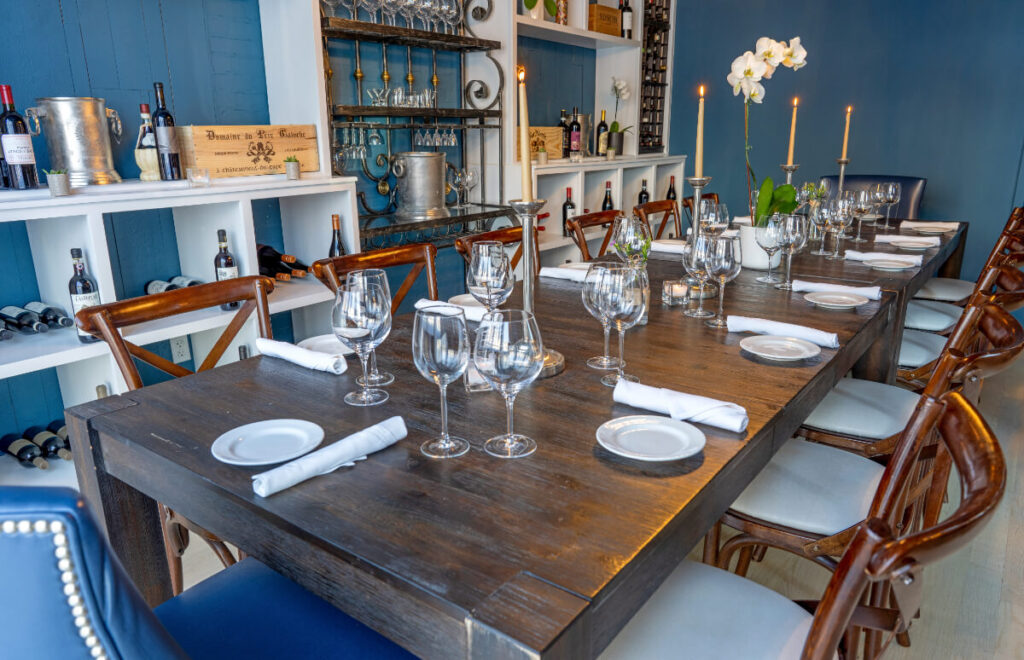 A wooden table in Divina