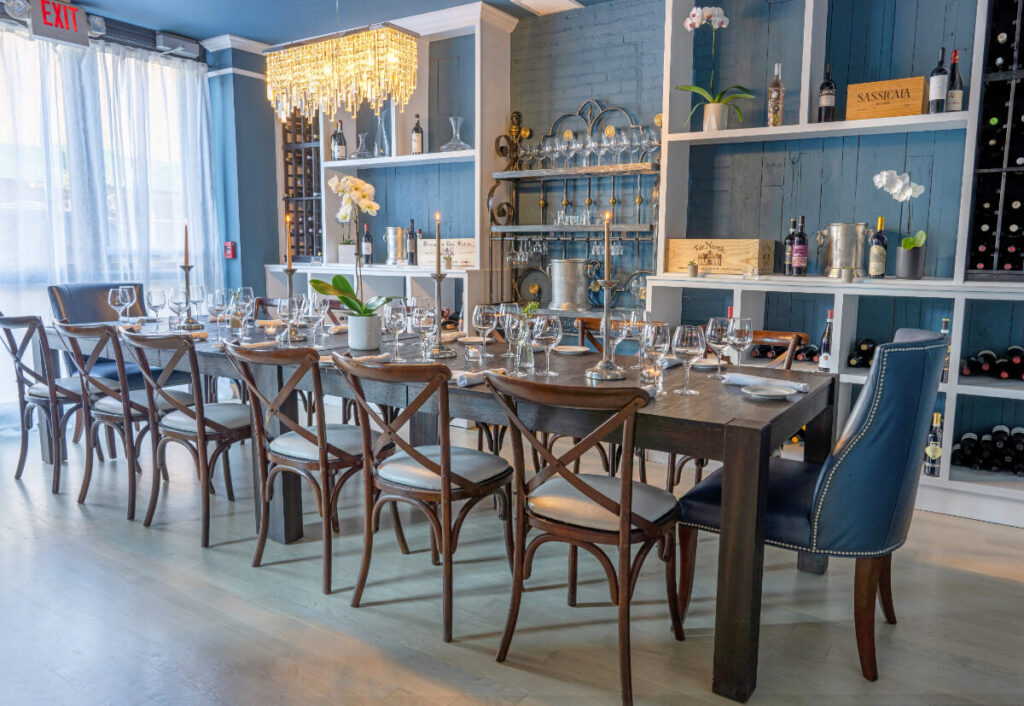 A wooden table in Divina