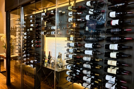 A wall of amazing wine from Divina's wine cellar