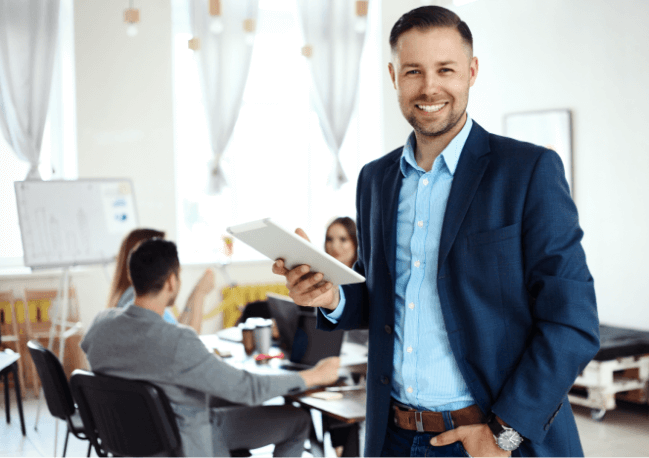 A smiling man in an office