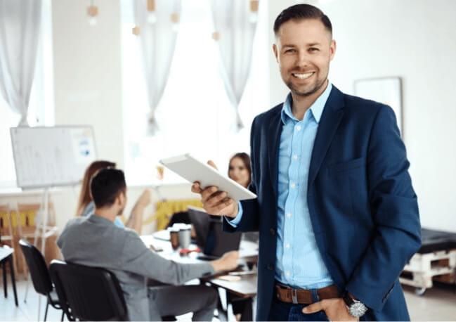 A smiling man in an office
