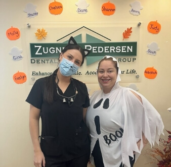 Staff members in Halloween costumes