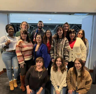 The dental team together at a Christmas party