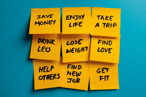 a collection of sticky notes with the most common new year's resolutions