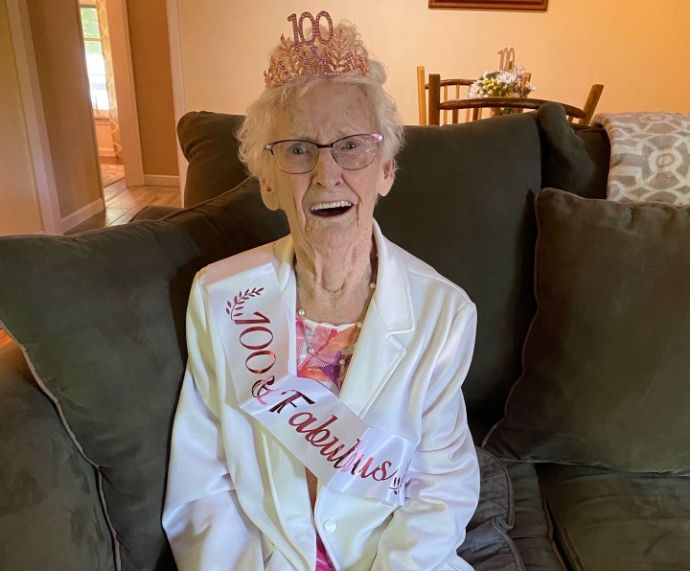 Norma, the cherished mother-in-law, smiling on her 100th birthday.