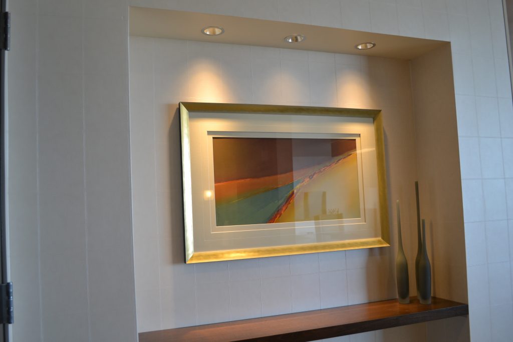 framed artwork on the wall of an office building