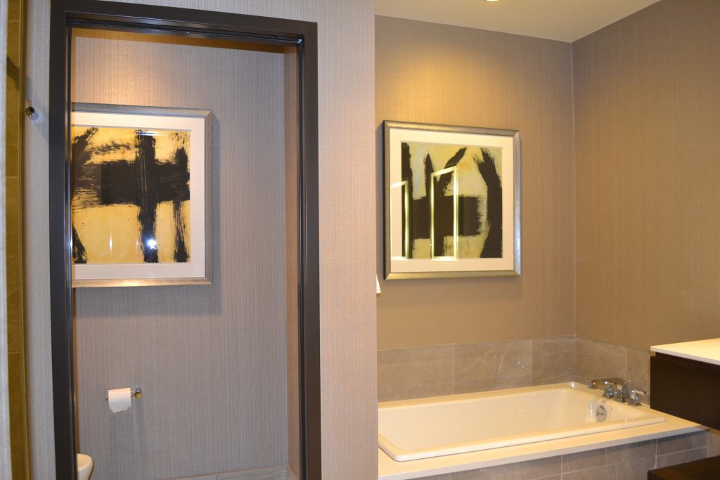 framed artwork in a bathroom